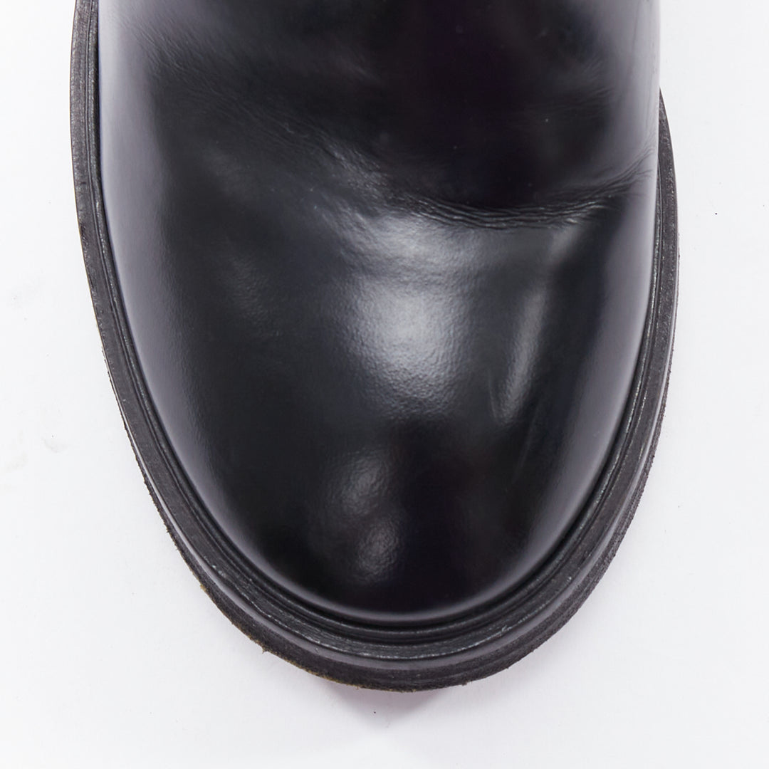 Female mannequin wearing Acne Studios Dion Black Leather Women Boots in Size EU38 | Available at JHROP