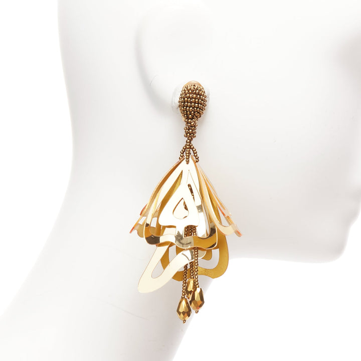 Female mannequin wearing Oscar de la Renta Gold Acrylic Women Jewelry Earring in Size  | Available at JHROP