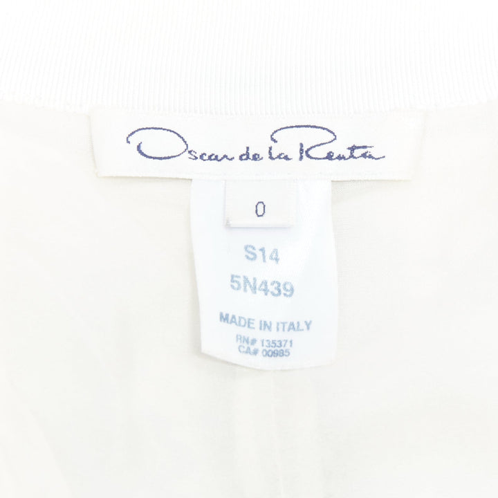 Female mannequin wearing Oscar de la Renta by Oscar De La Renta S14 White Silk Women Skirt in Size US0 | Available at JHROP