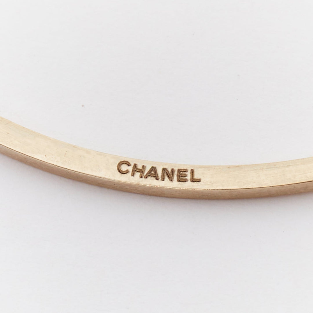 CHANEL 14S Runway Orbital large XL pearl CC logo gold metal bangle M