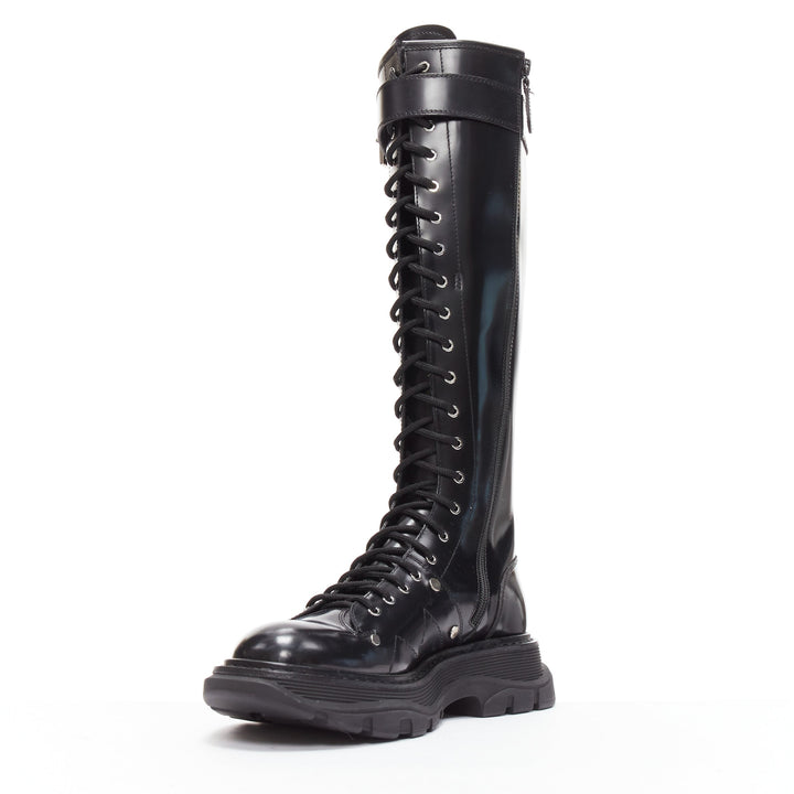 ALEXANDER MCQUEEN Tread black leather lace up combat knee high boot EU39