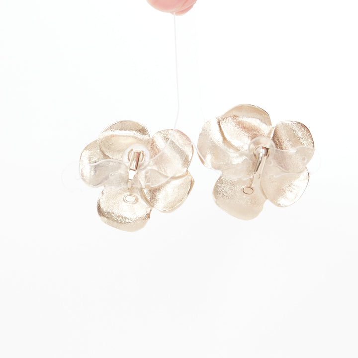 CHANEL 2024 L24B clear crystal gold tone camellia CC logo clip earring Pair