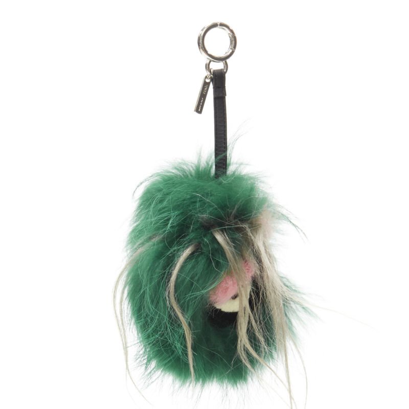  mannequin wearing Fendi Monster Bug Green Fur Key Chain in Size  | Available at JHROP