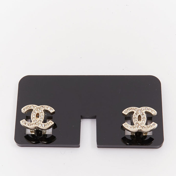 CHANEL silver tone crystal pave CC logo cable clips phone charm Set of Two