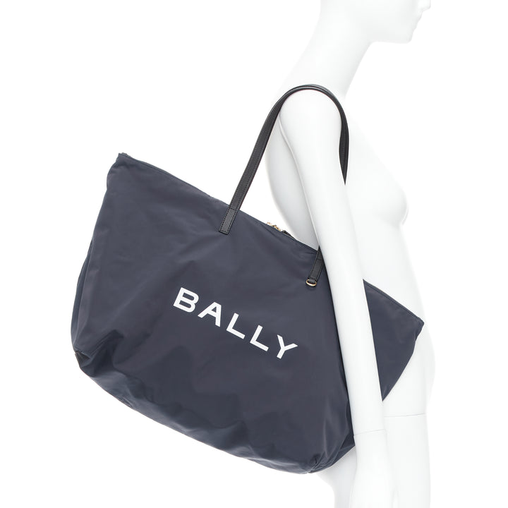 BALLY navy nylon white logo travel luggage foldable shoulder tote bag