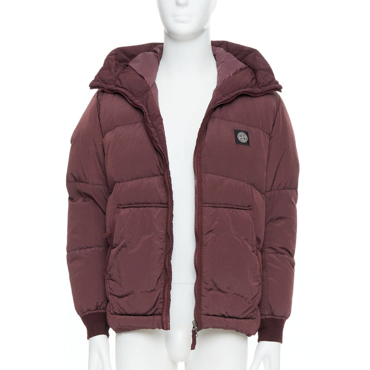 Male mannequin wearing Stone Island Purple Nylon Men Puffer Jacket in Size  M | Available at JHROP