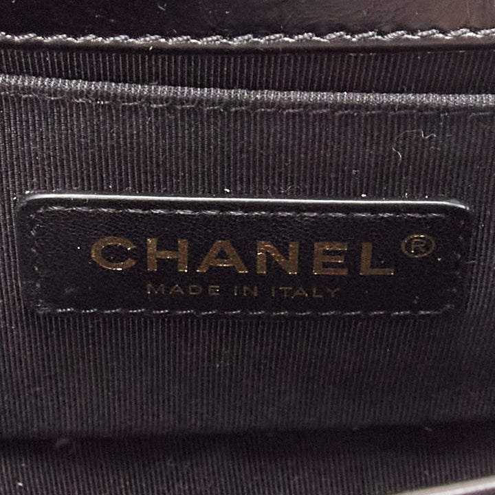 CHANEL Boy Small black shearling leather gold CC push lock chain flap bag