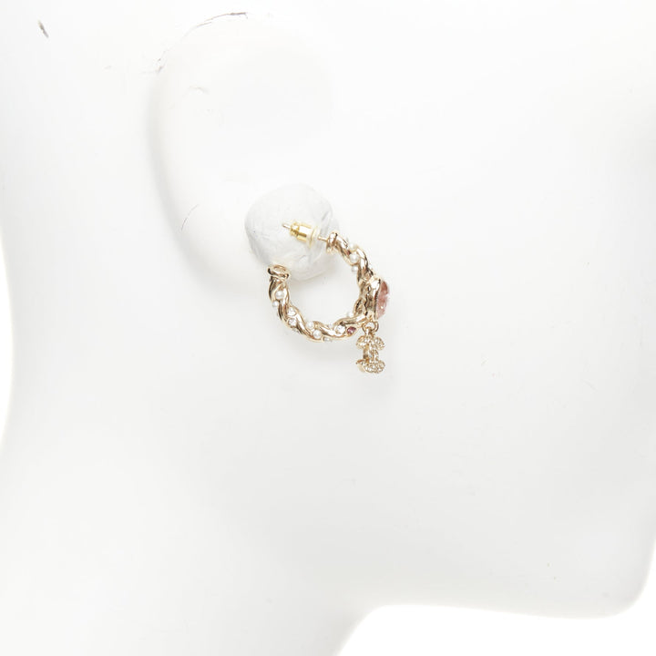 CHANEL 2023 Runway pink stone twisted chain CC crystal rhinestone hoop earrings