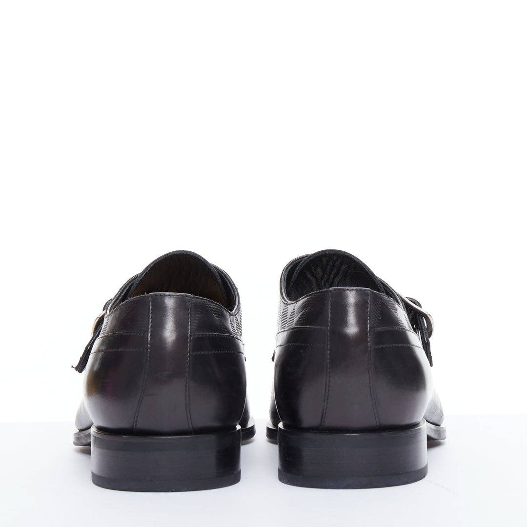 Male mannequin wearing Louis Vuitton District Black Leather Men Loafer in Size UK6.5 | Available at JHROP