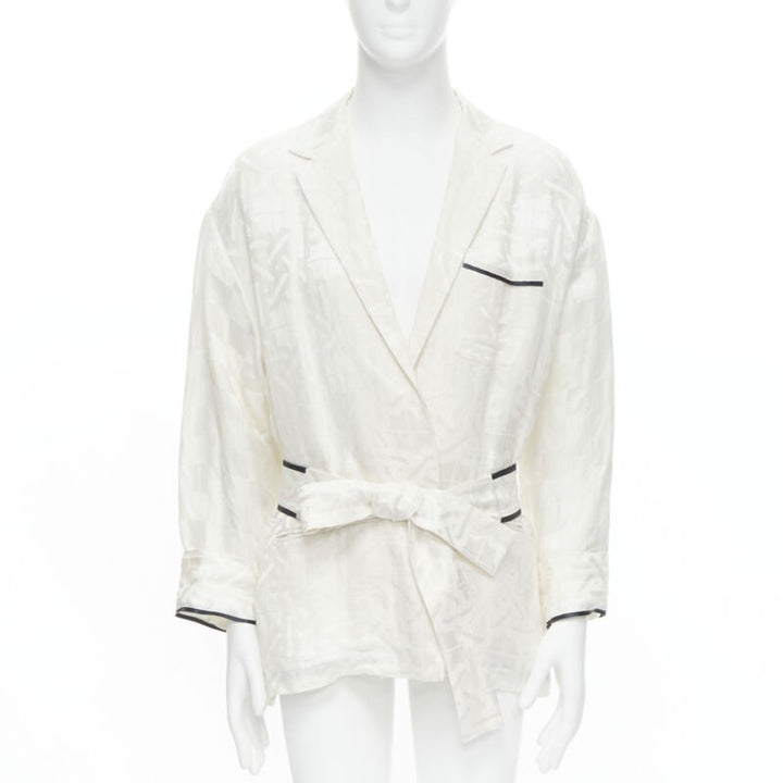 Female mannequin wearing Haider Ackermann White Linen Women Top in Size FR36 | Available at JHROP