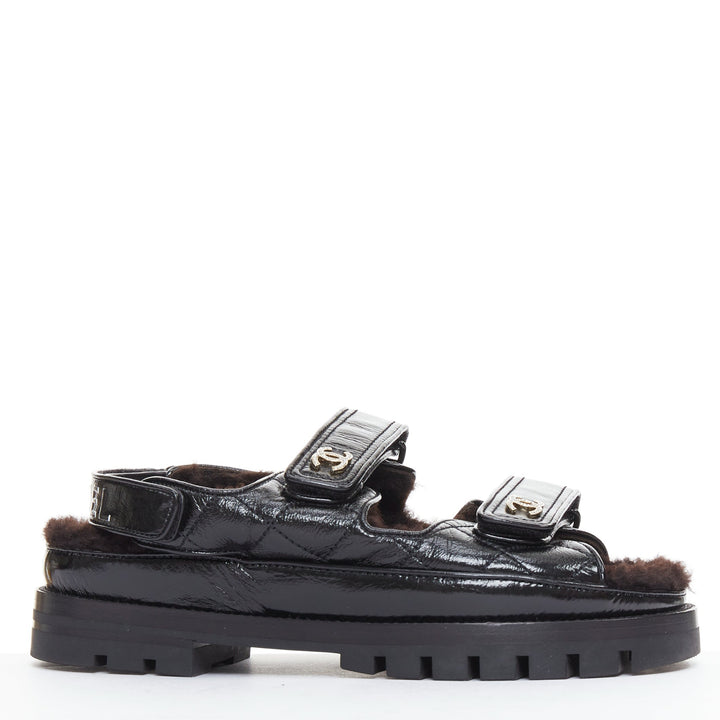 CHANEL 2023 black laminated lambskin shearling crystal CC dad sandals EU37