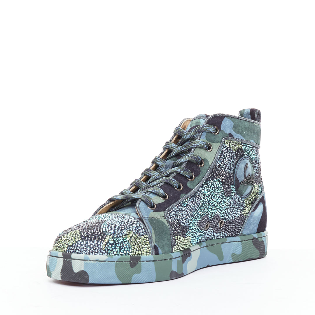 Male mannequin wearing Christian Louboutin Louis Orlato Strass Blue Suede Men Sneaker in Size EU42 | Available at JHROP