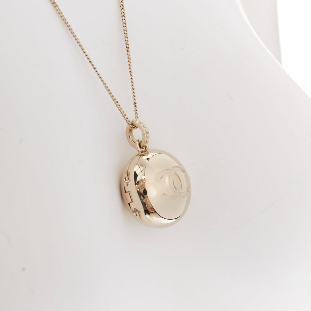 CHANEL B21S champagne gold tone CC logo clasp locket pendent necklace