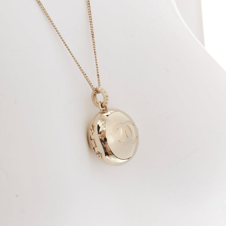 CHANEL B21S champagne gold tone CC logo clasp locket pendent necklace