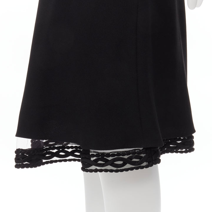 Female mannequin wearing Dior by John Galliano Black Acetate Women Skirt in Size FR38 | Available at JHROP