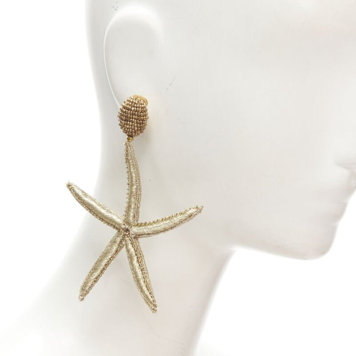 OSCAR DE LA RENTA gold Large Starfish bead embellished clip on earrings