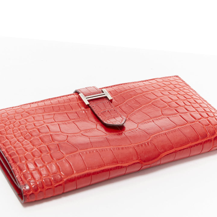 Female mannequin wearing Hermes Bearn Red Leather Women Wallets in Size  | Available at JHROP