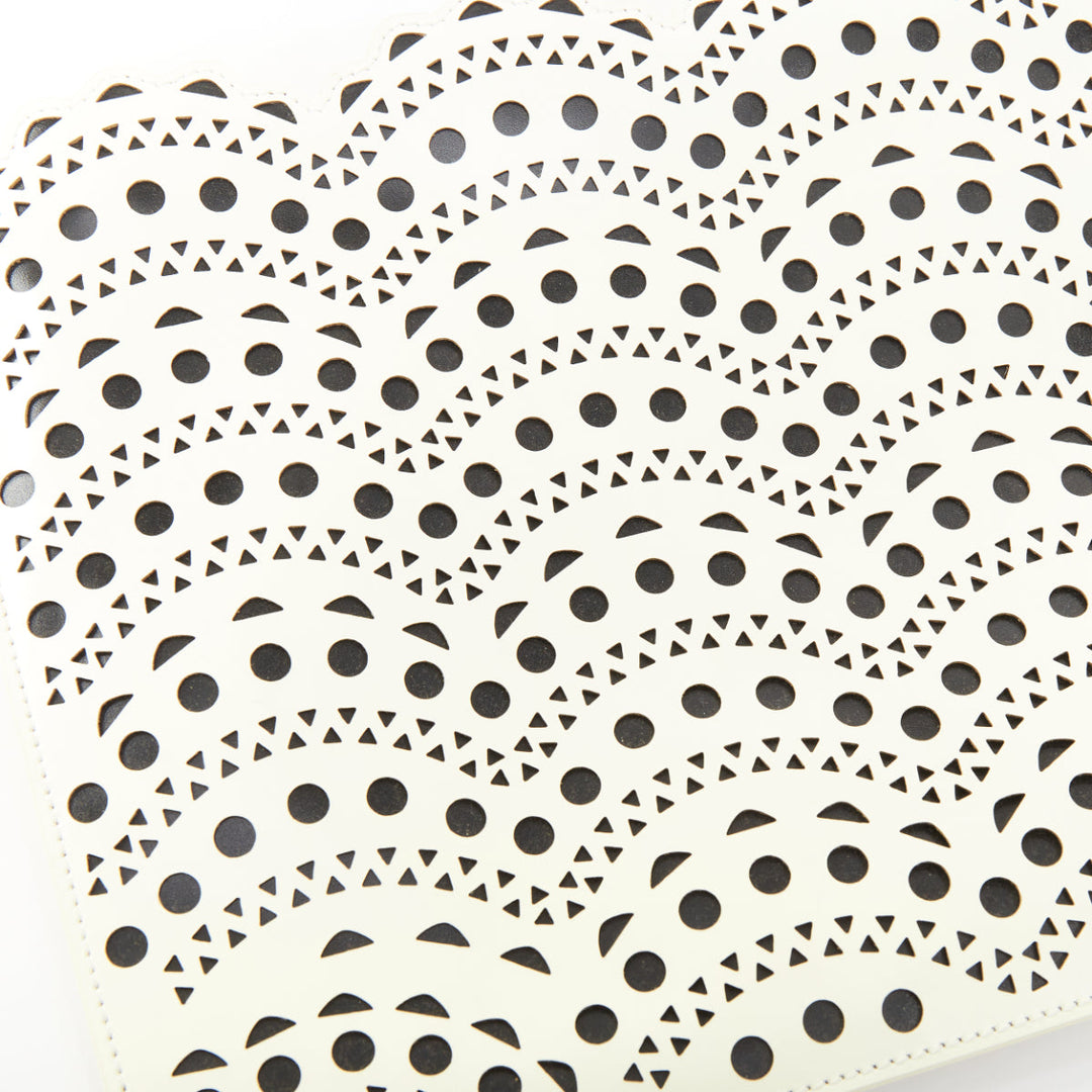 ALAIA Vienne laser cut white leather black lined scalloped zip pouch clutch bag
