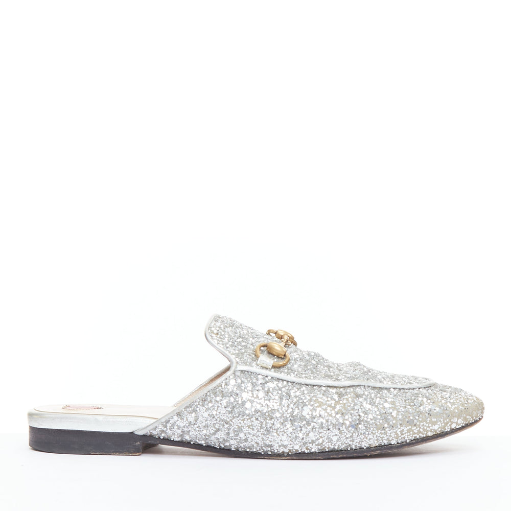 Female mannequin wearing Gucci by Alessandro Michele Princetown Silver Fabric Women Flats in Size EU36.5 | Available at JHROP