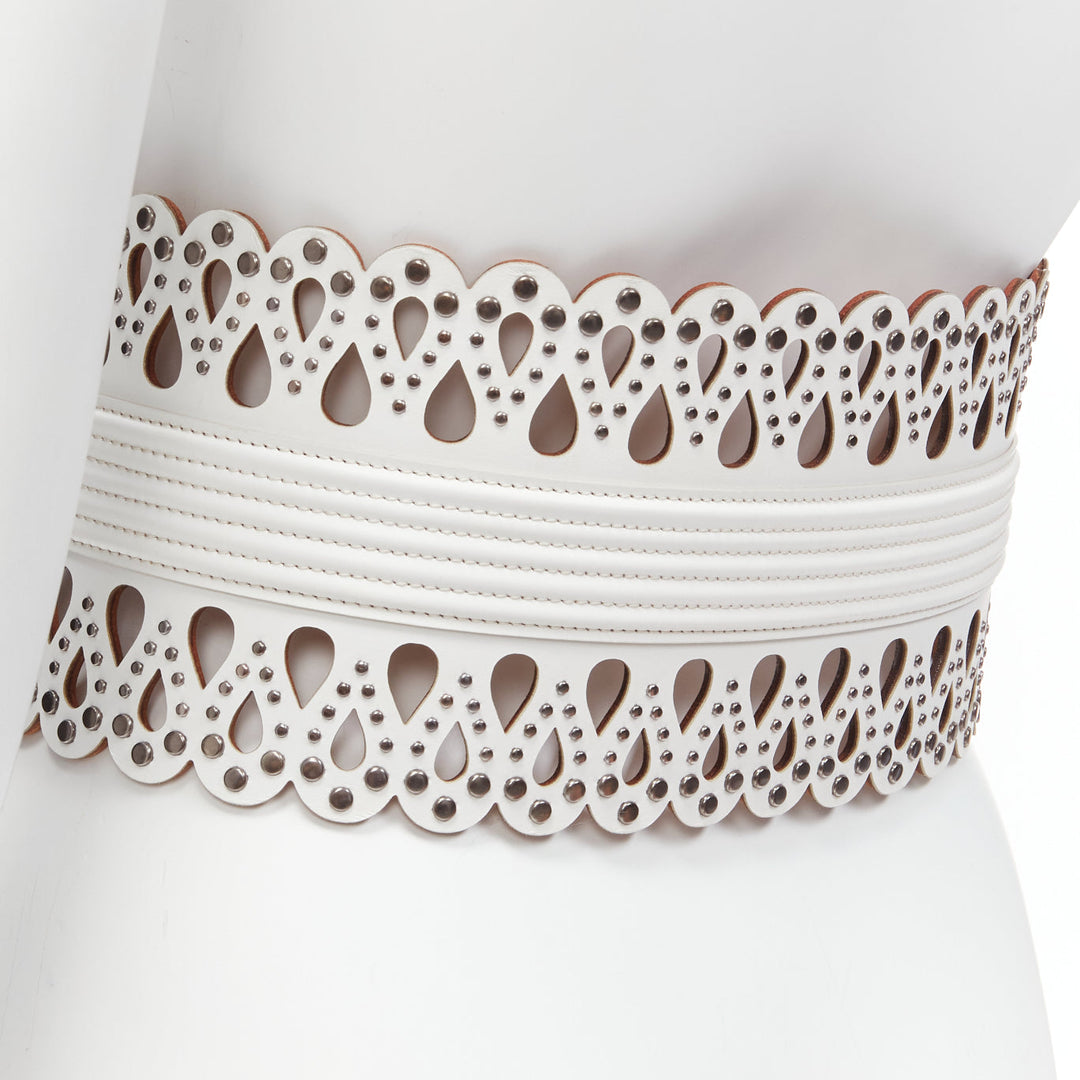 AZZEDINE ALAIA white laser cut studded leather corset waist belt 70cm