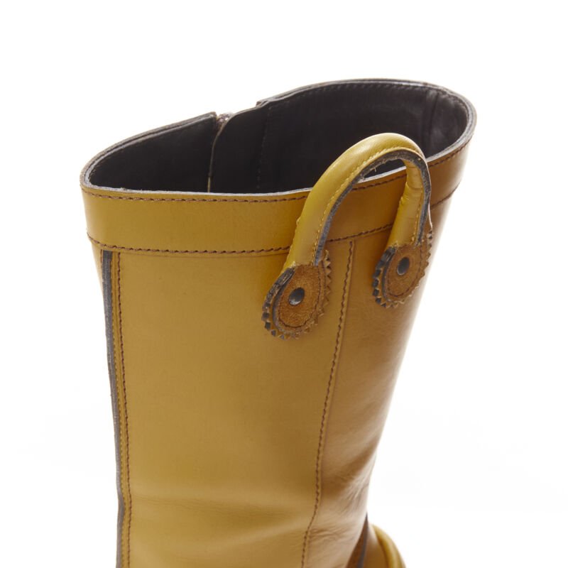 Female mannequin wearing Dsquared2 Yellow Yellow Leather Women Boots in Size EU36.5 | Available at JHROP