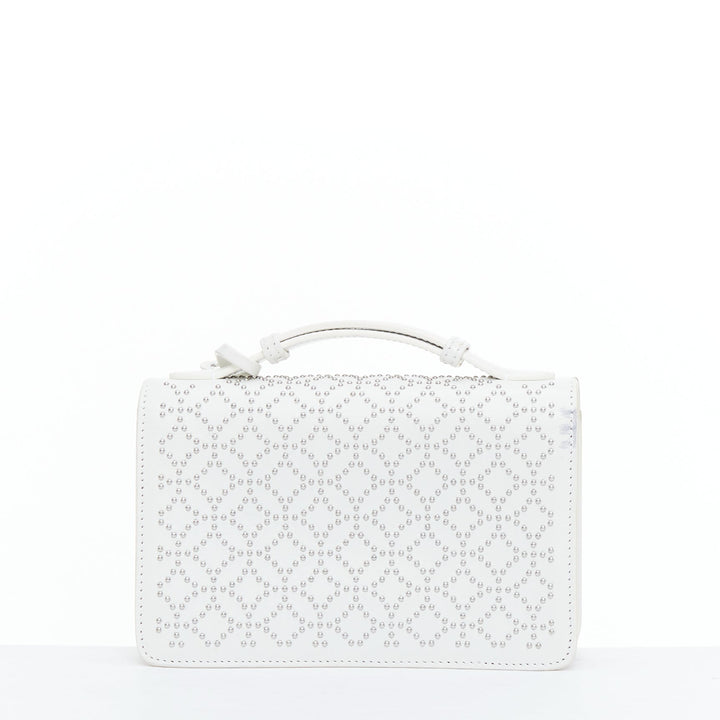 ALAIA Arabesque Franca white silver studded crossbody bag