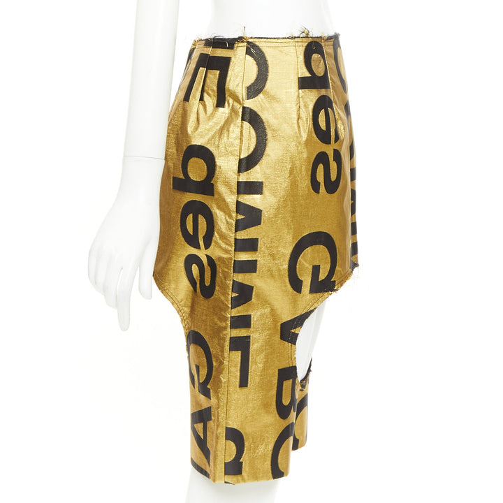 COMME DES GARCONS 2020 Runway gold black polyester silk logo cut out shorts M