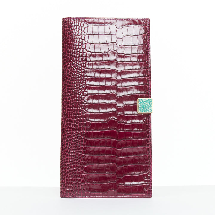 SMYTHSON Mara burgundy croc embossed high gloss teal clasp passport cover