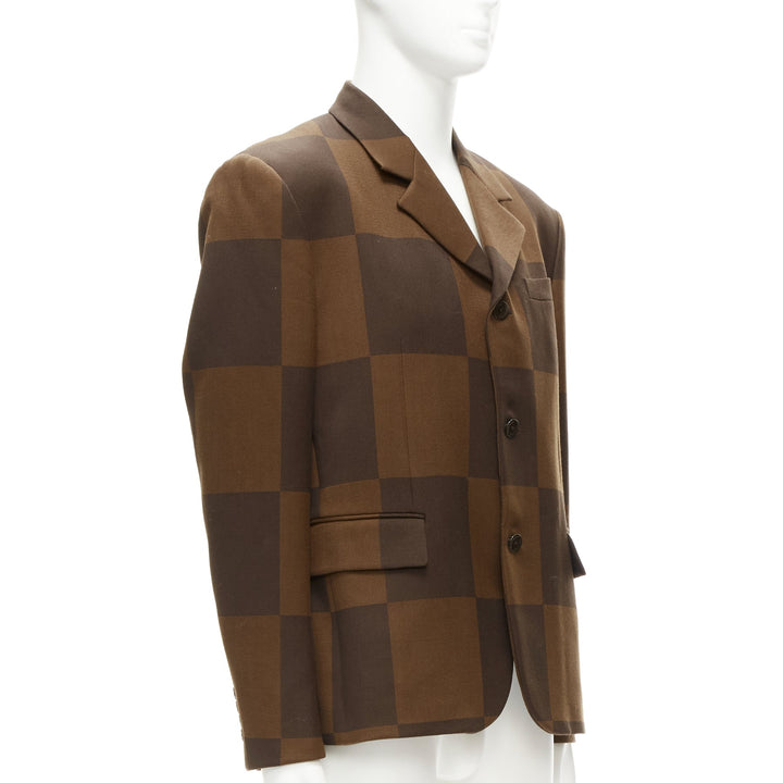 Male mannequin wearing Louis Vuitton Nigo 2020 LV2 Runway Brown Wool Men Blazers in Size EU52 | Available at JHROP