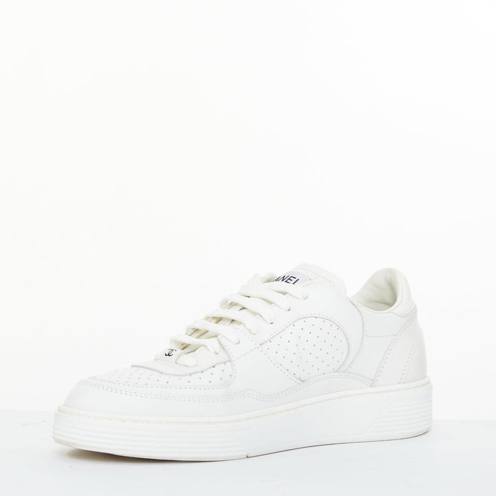 CHANEL 2023 white calfskin perforated CC logo lowtop trainer court sneakers EU38