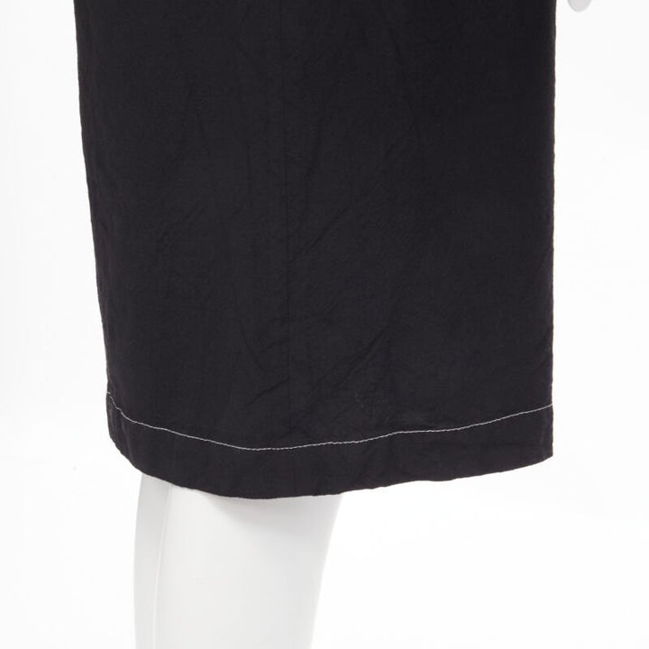 Female mannequin wearing Junya Watanabe 1994 Black Wool Women Casual Dress in Size  S | Available at JHROP