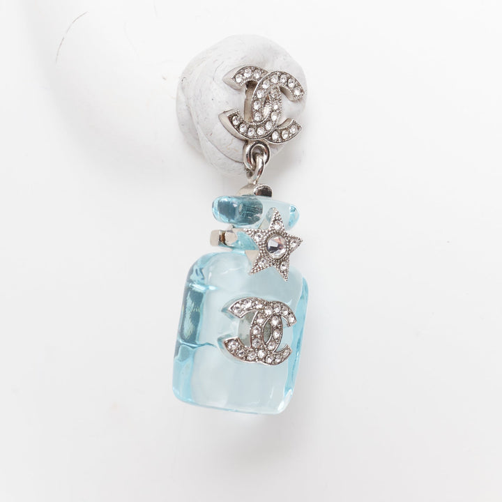 CHANEL B23S Cocomark blue acrylic perfume bottle CC logo star pin earrings Pair