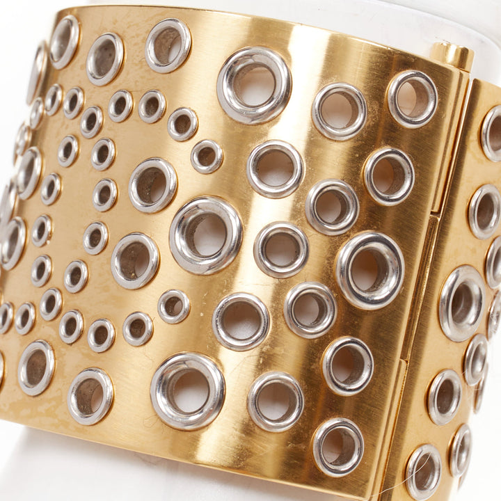 CHANEL B16 gold tone silver CC logo punctured grommet eyelet cuff bangle