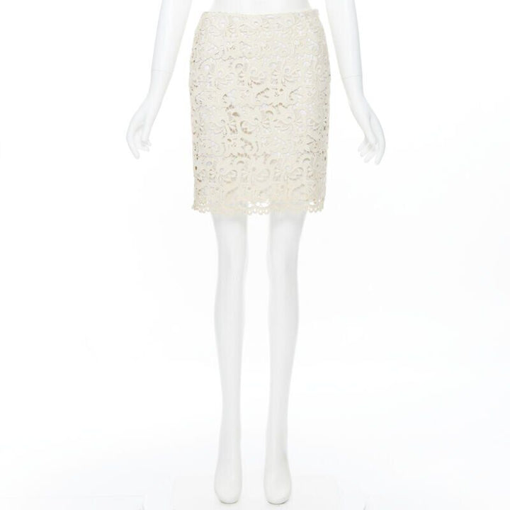 Female mannequin wearing Michael Kors Lace skirt
 Beige Lace Women Skirt in Size US2 | Available at JHROP