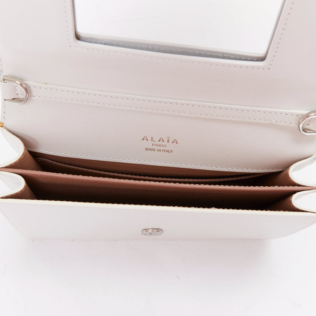 ALAIA Arabesque Franca white silver studded crossbody bag