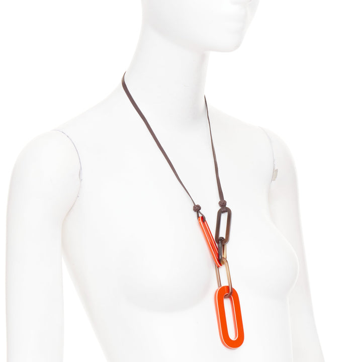 HERMES Mayance orange lacquered buffalo horn oval link pendant necklace