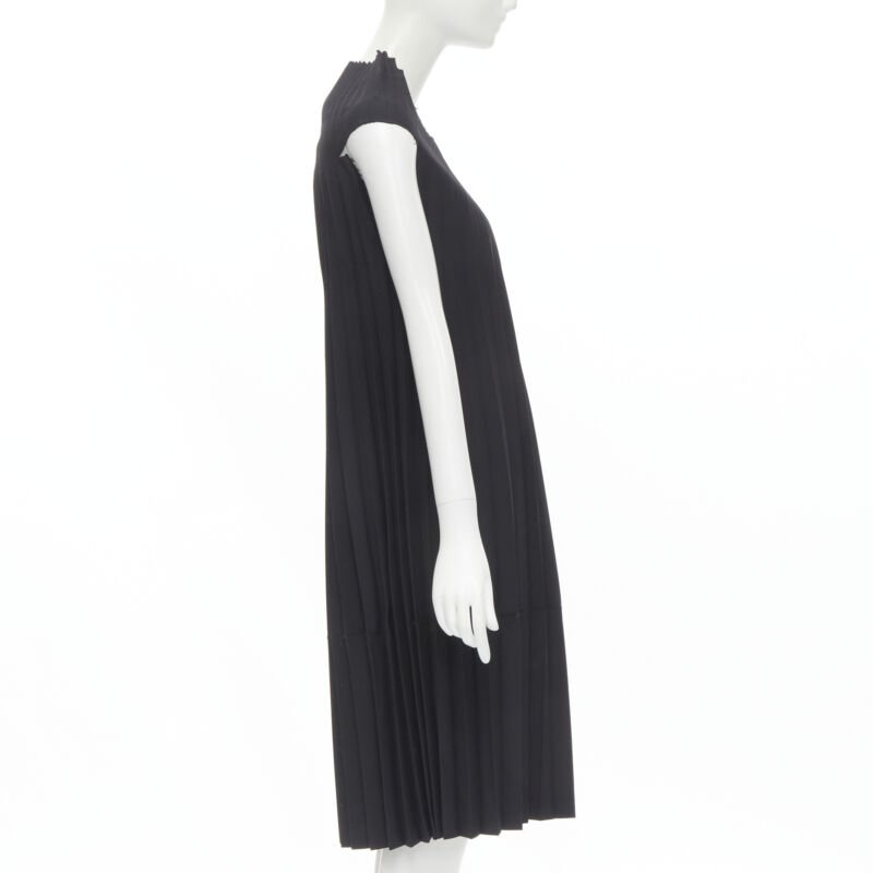 Female mannequin wearing Junya Watanabe 1998 Runway Black Cotton Women Cocktail Dresses in Size  S | Available at JHROP