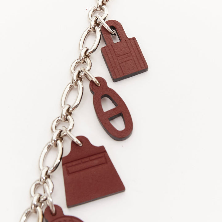 HERMES Breloque Olga Amulet dark brown leather charms silver bag chain
