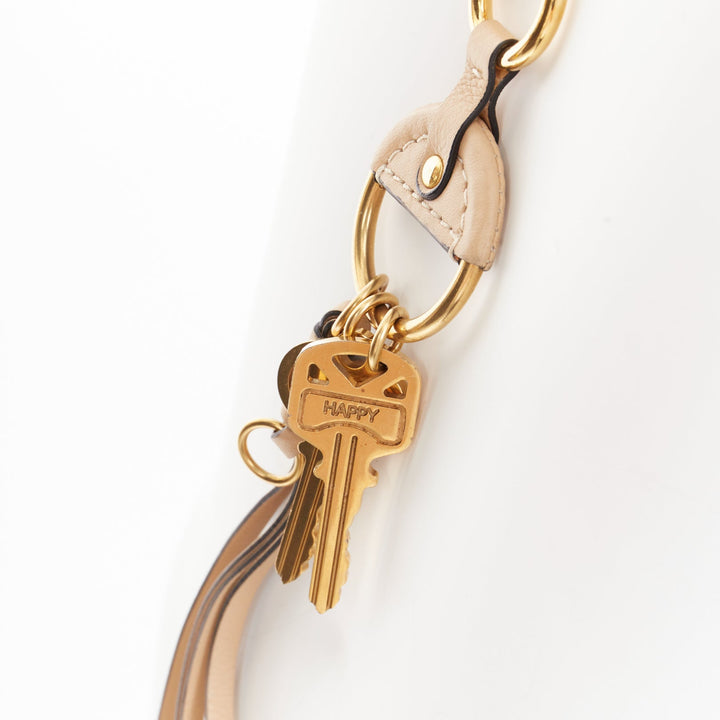 CHLOE Nicole brown leather gold Happy key chain bag charm long necklace