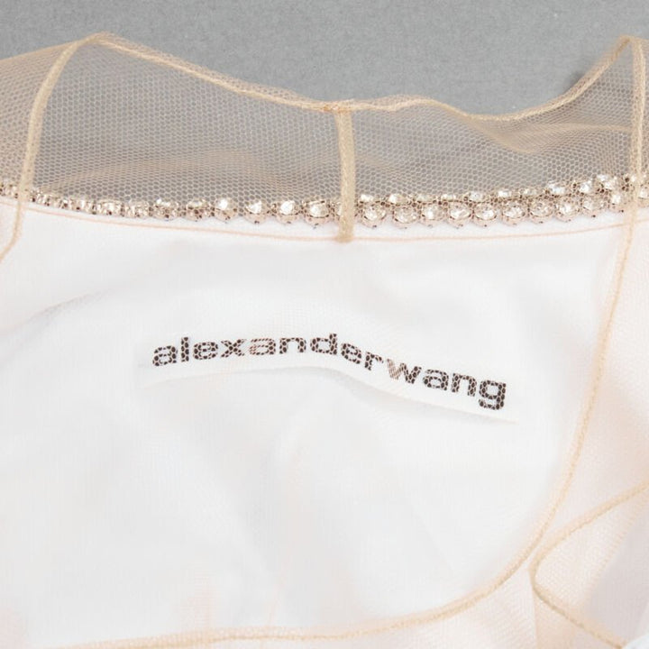 Female mannequin wearing Alexander Wang White Feels like cotton Women Top in Size  | Available at JHROP