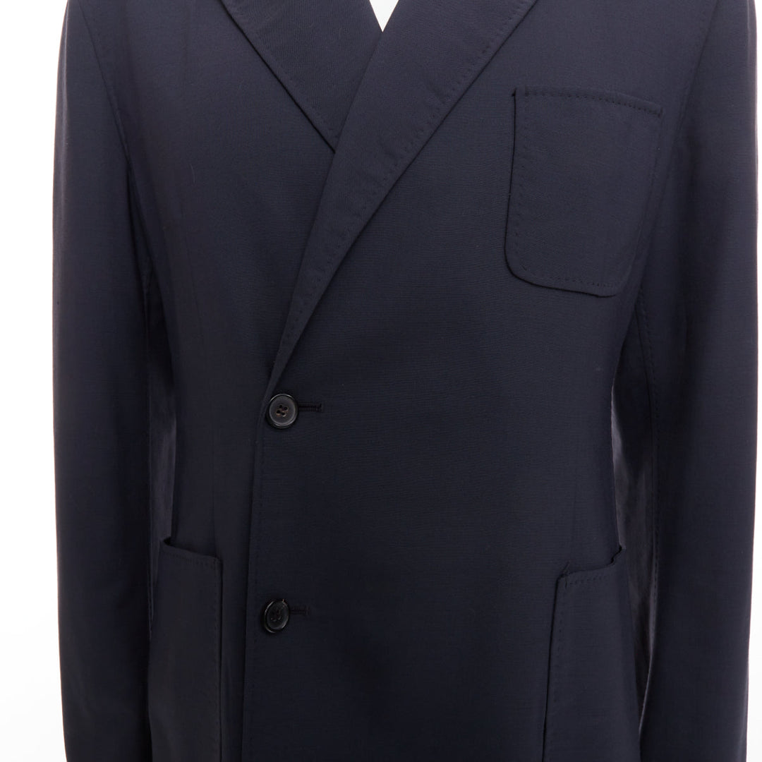 RAF SIMONS black virgin wool off centre buttons patch pocket long blazer IT48 M