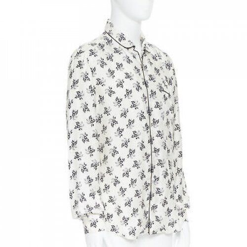 Female mannequin wearing Dolce Gabbana Silk shirt White Silk Women Top in Size IT4 | Available at JHROP