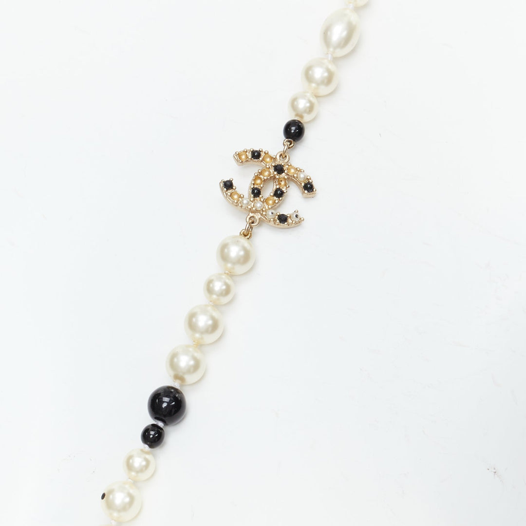 CHANEL 08P black Camelia enamel station faux pearl CC long necklace