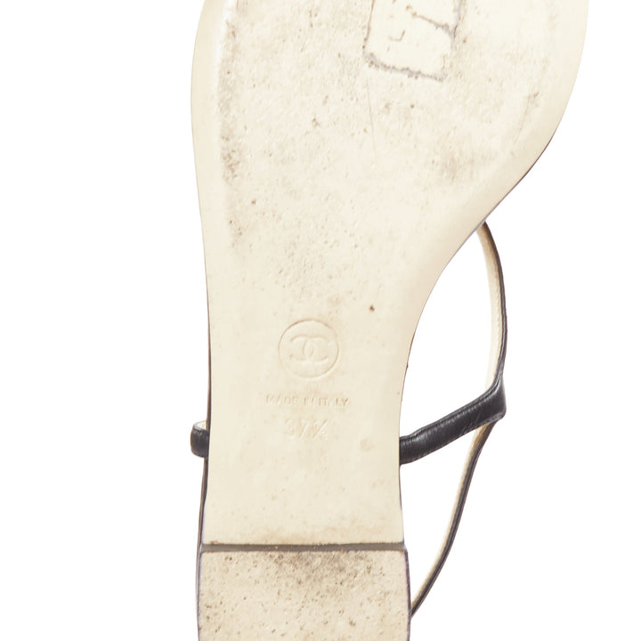 CHANEL black leather silver CC logo camellia flat T strap sandals EU37.5