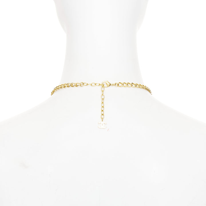 CHANEL 2023 Monte Carlo gold black glitter foil resin CC logo pendant  necklace