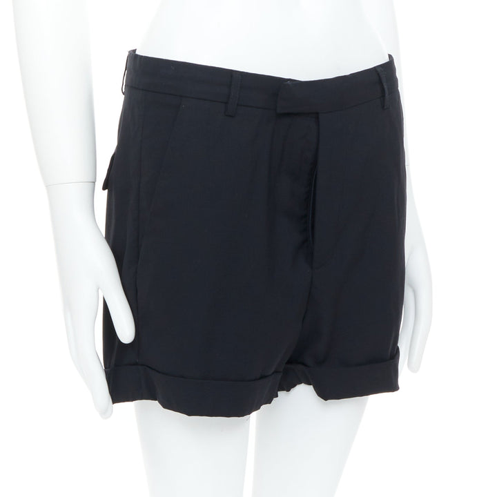 RAF SIMONS 2009 black wool mid rise tailored turn up trouser shorts EU50 L
