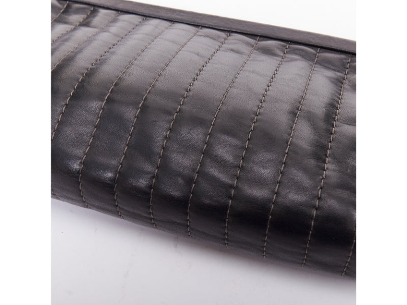 CHANEL 2005 Mademoiselle Ligne black vertical quilt lambskin kisslock clutch bag