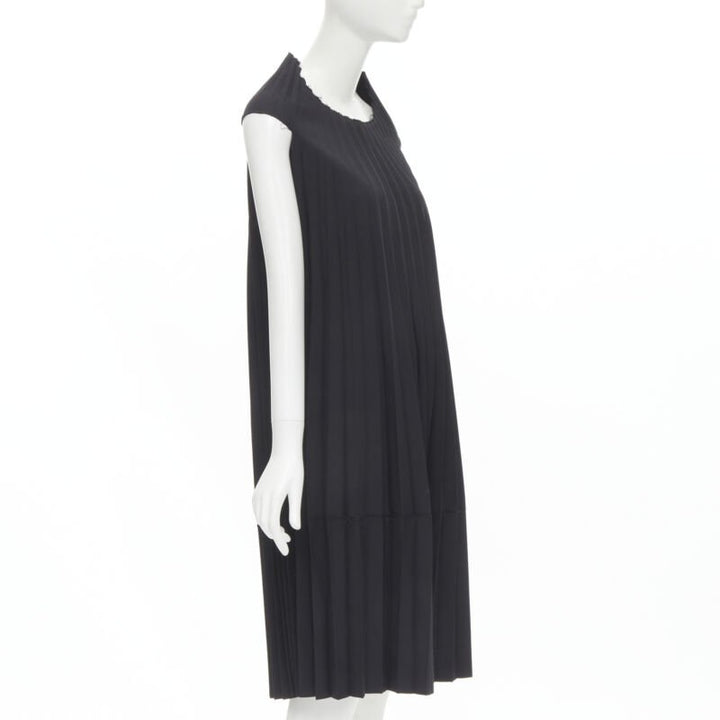 Female mannequin wearing Junya Watanabe 1998 Runway Black Cotton Women Cocktail Dresses in Size  S | Available at JHROP