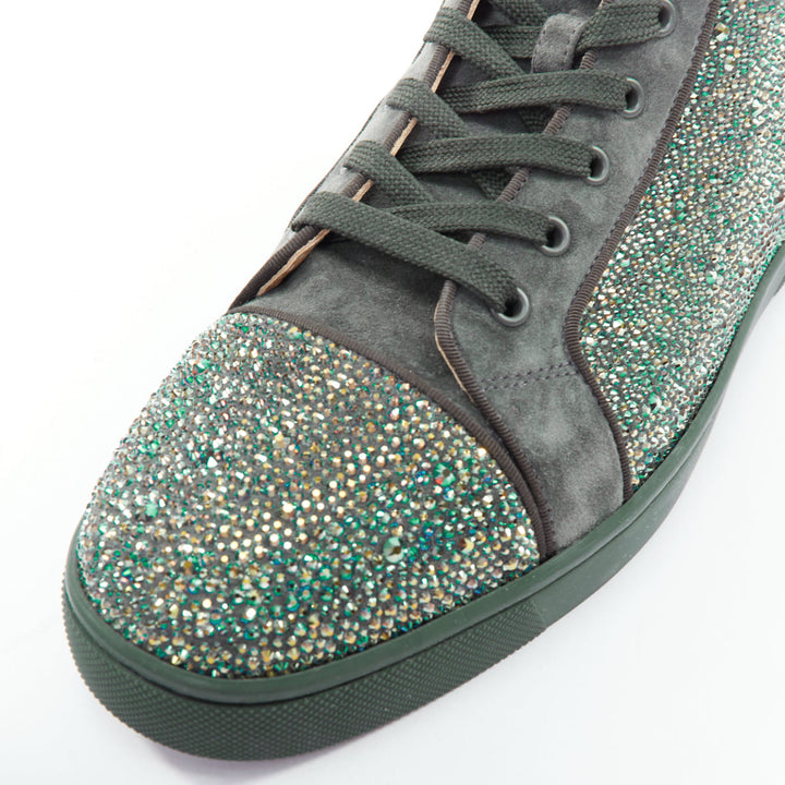 Male mannequin wearing Christian Louboutin Louis Orlato Green Suede Men Sneaker in Size EU42.5 | Available at JHROP