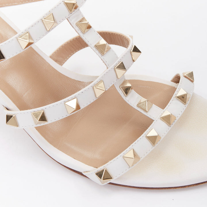 VALENTINO Rockstud 60 white leather gold stud caged block sandals EU39